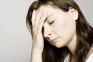 A young woman suffering from one of many different types of anxiety disorders