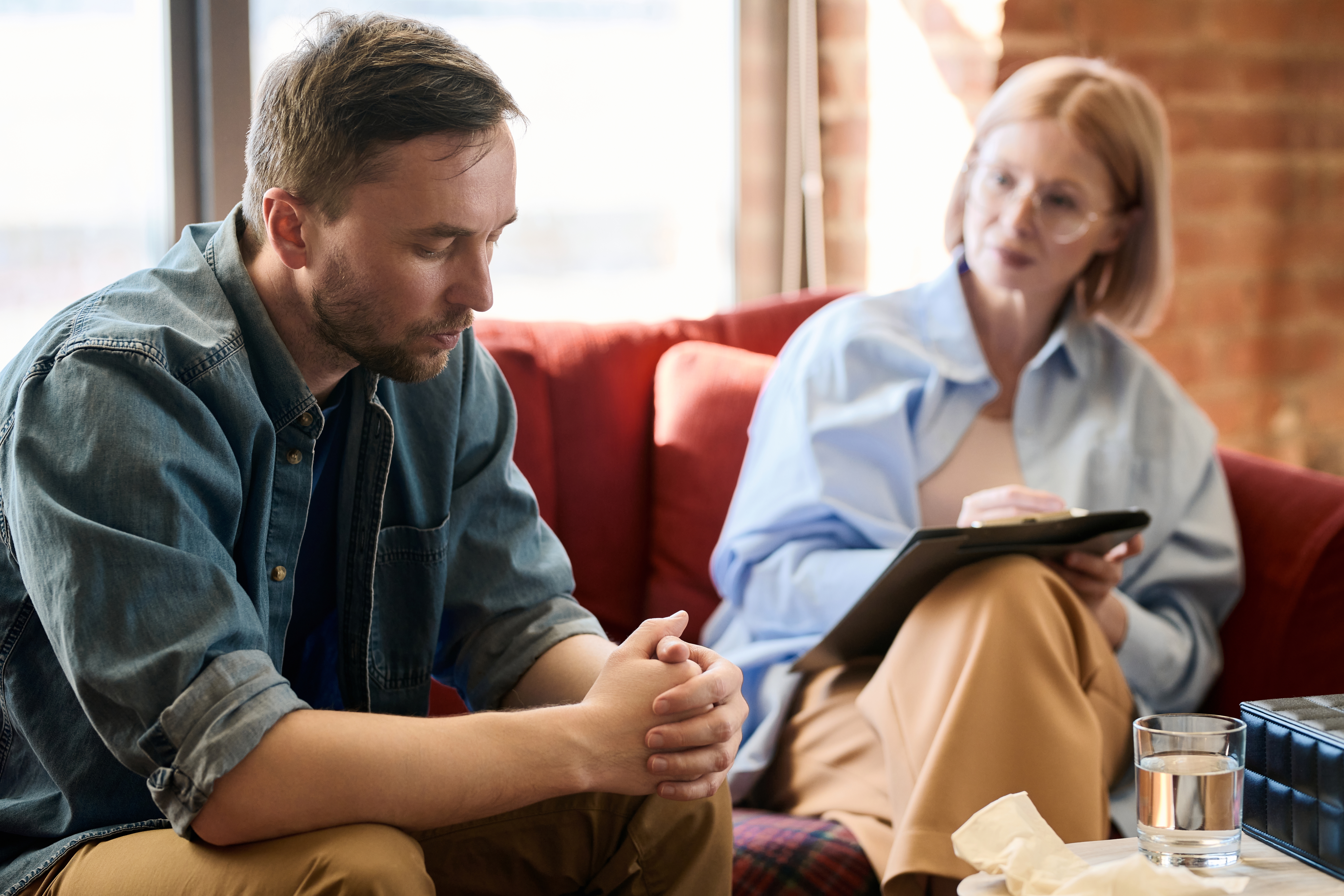 Man talking to his therapist about dual diagnosis treatment malibu.